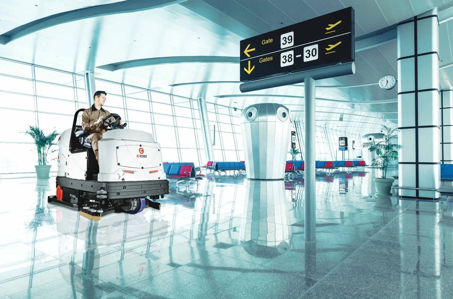 Comac scrubber-drier cleaning an airport terminal floor