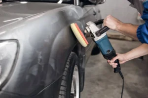 Man polishing and cleaning a car